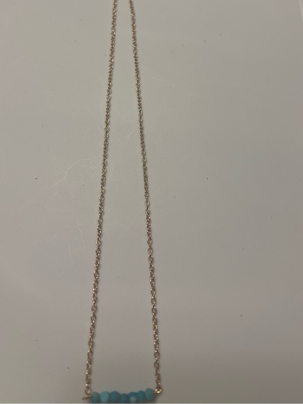 Kris Nations Turquoise necklace in small bottle